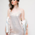 Brunette in shiny dress