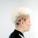 woman with blonde mohawk and colored sides