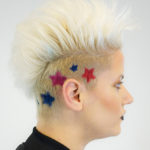woman with blonde mohawk and colored sides