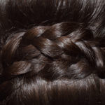 Dark hair braid close up