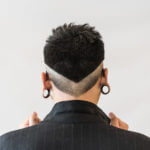Back view of half shaved hair style