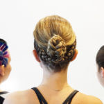 Three women with mosaic hair styles